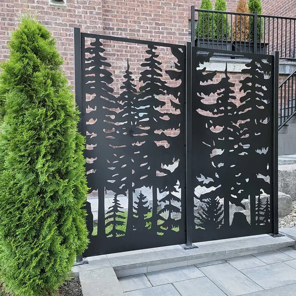 Black metal gate with forest design