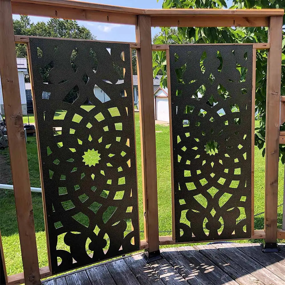 Brown decorative metal screen panels with intricate geometric patterns and a central floral motif.