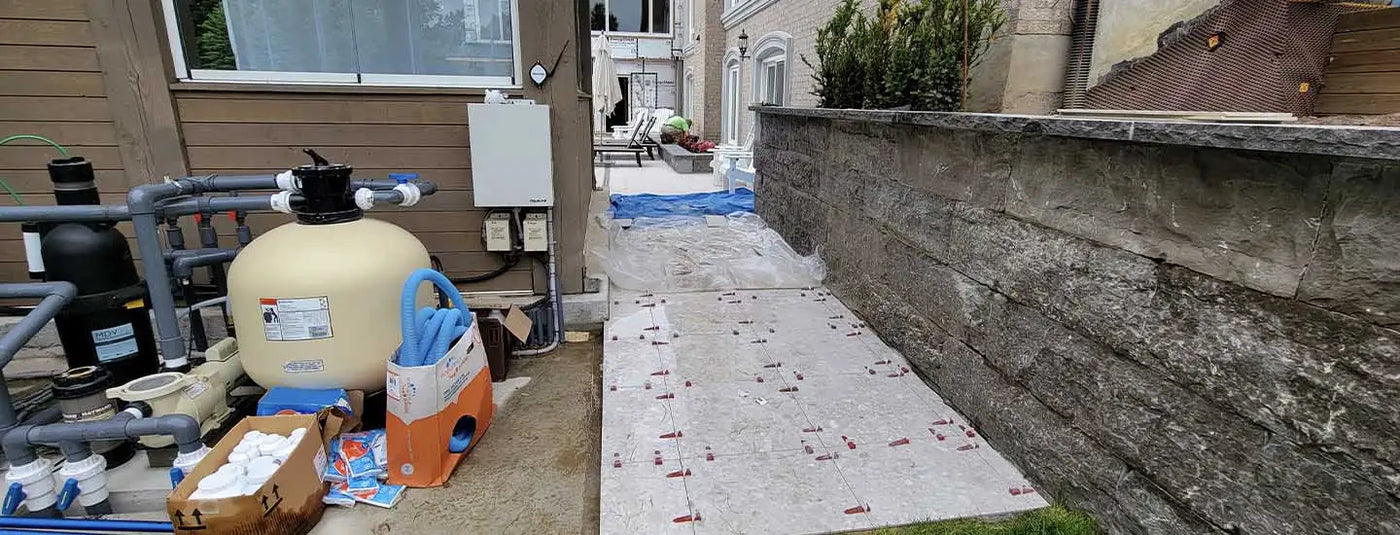 Pool filter system with beige and orange tank, black lid, and white pump.