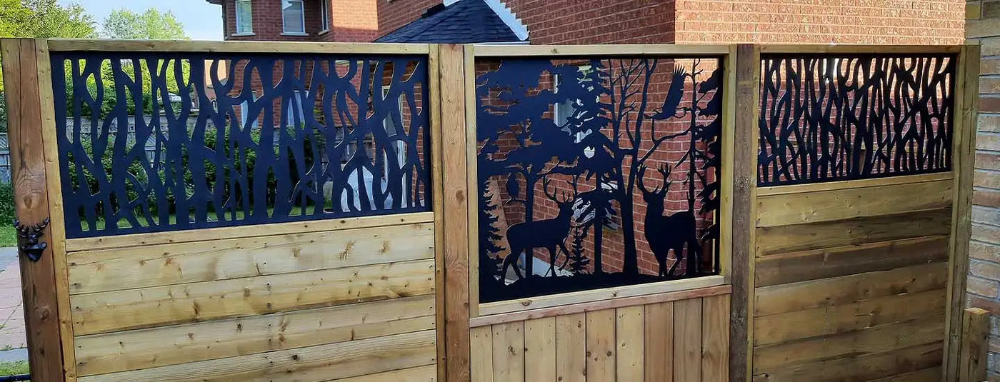 Wooden fence with black laser cut deer design and natural wood finish.