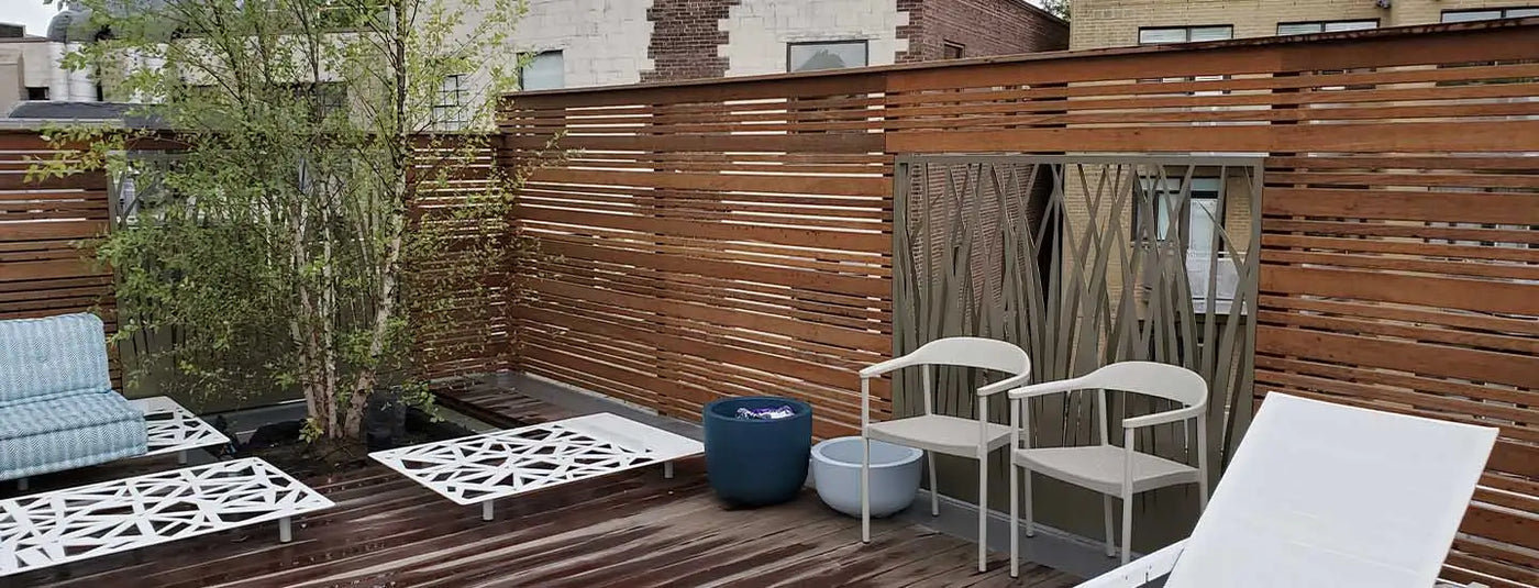 Wooden slatted privacy screen with modern design and natural finish.